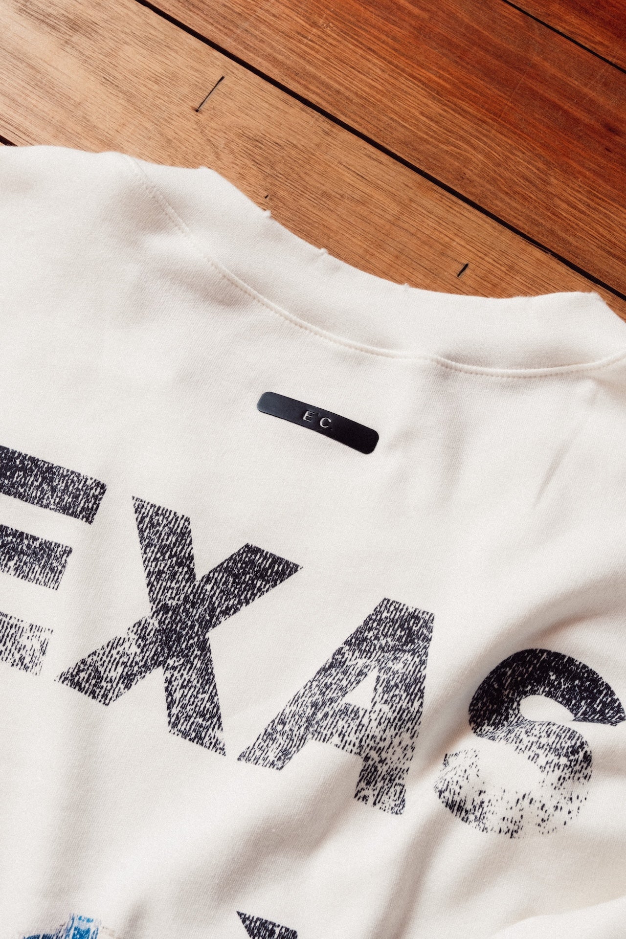 Tee Texas` Boots E`C. Off White