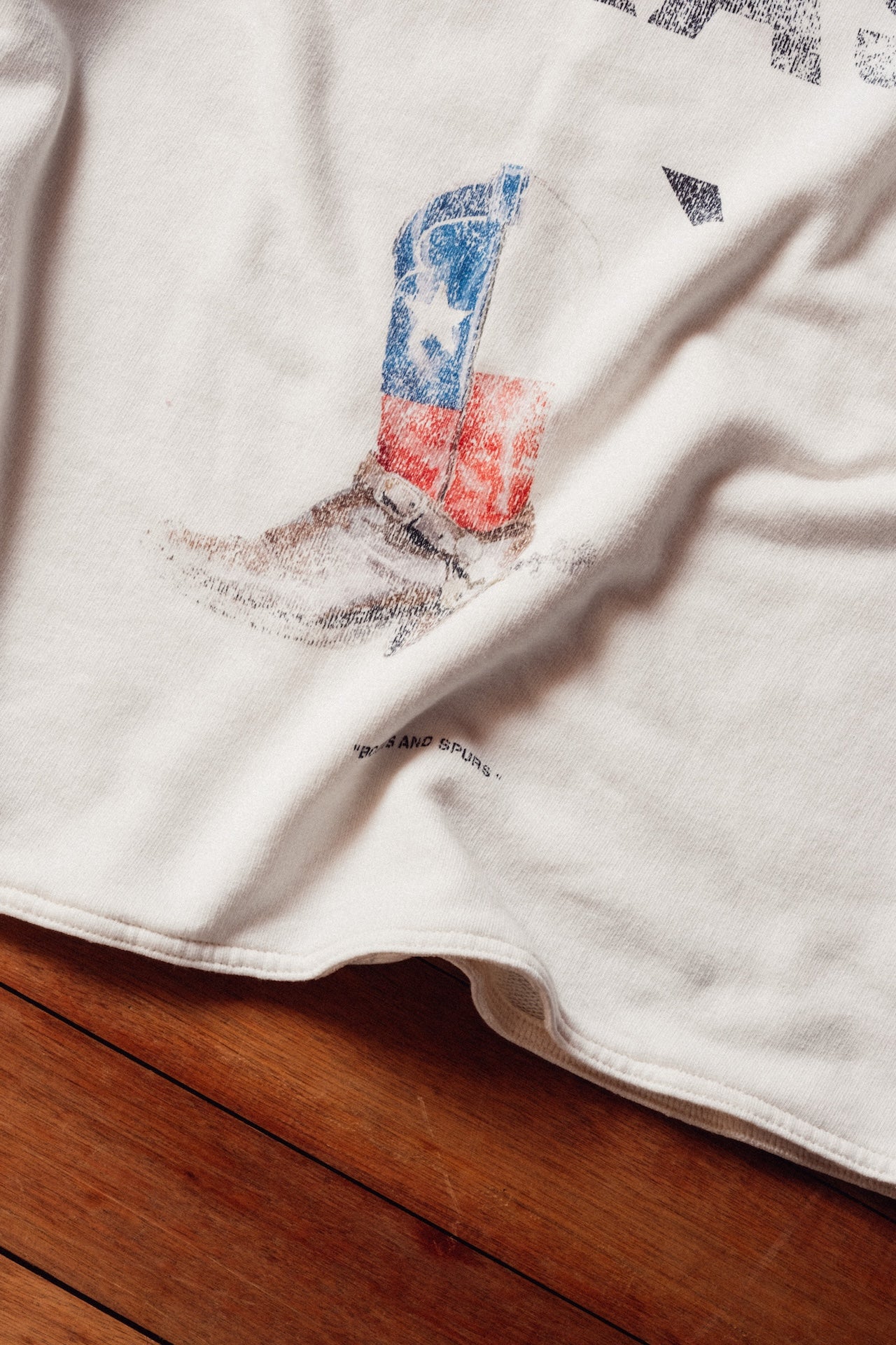 Tee Texas` Boots E`C. Off White