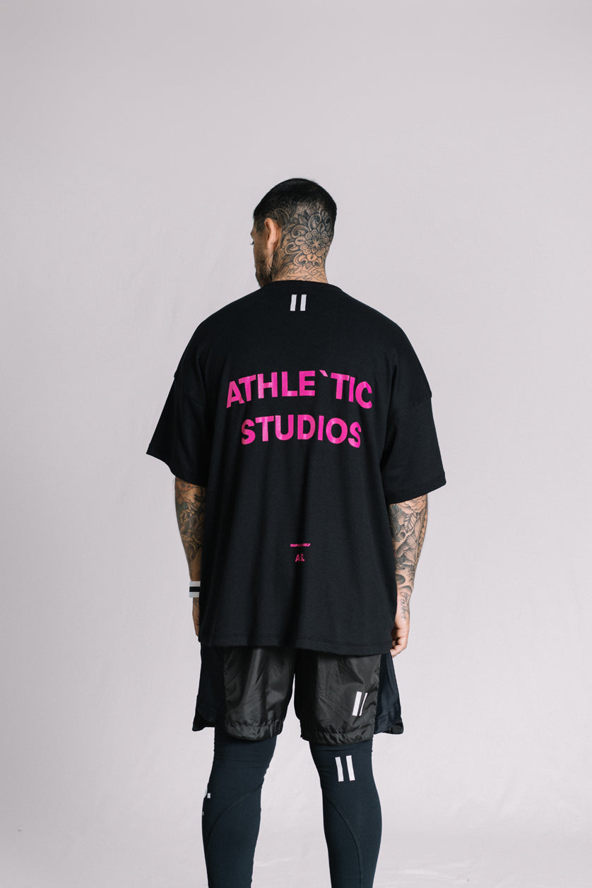 Camiseta Athle`tic. Studios - Preta/Rosa